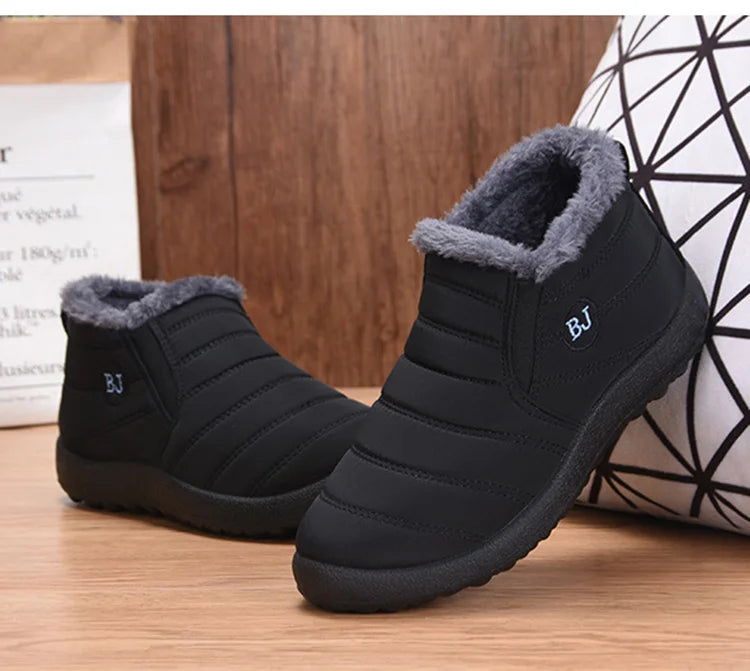 Women’s waterproof fur snow boots by The Clothing Company Sydney, slip-on ankle footwear with cozy fur lining for winter warmth.
