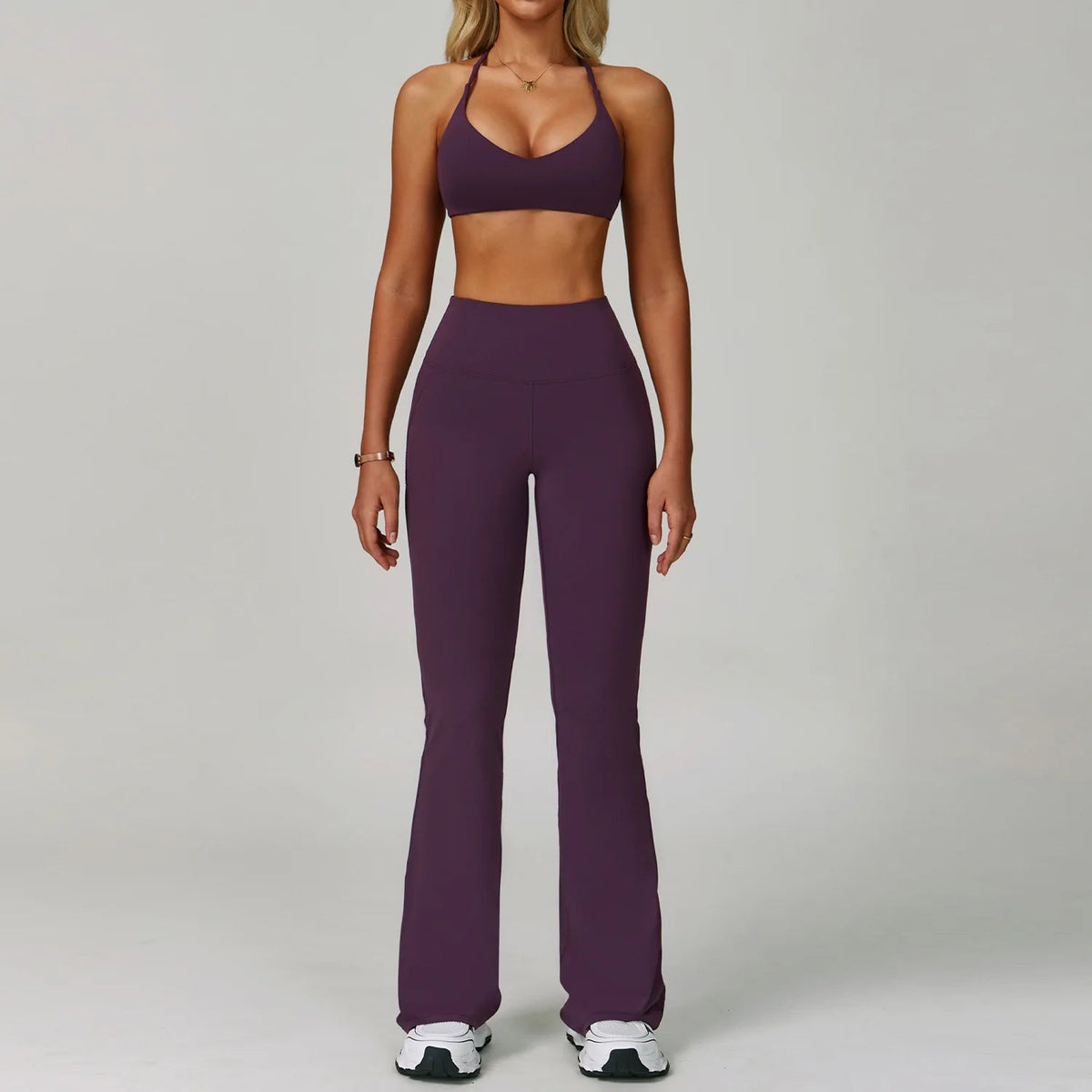 The Clothing Company Sydney women's 2-piece fitness tracksuit set with high waist leggings and sports bra for yoga and workout sessions.