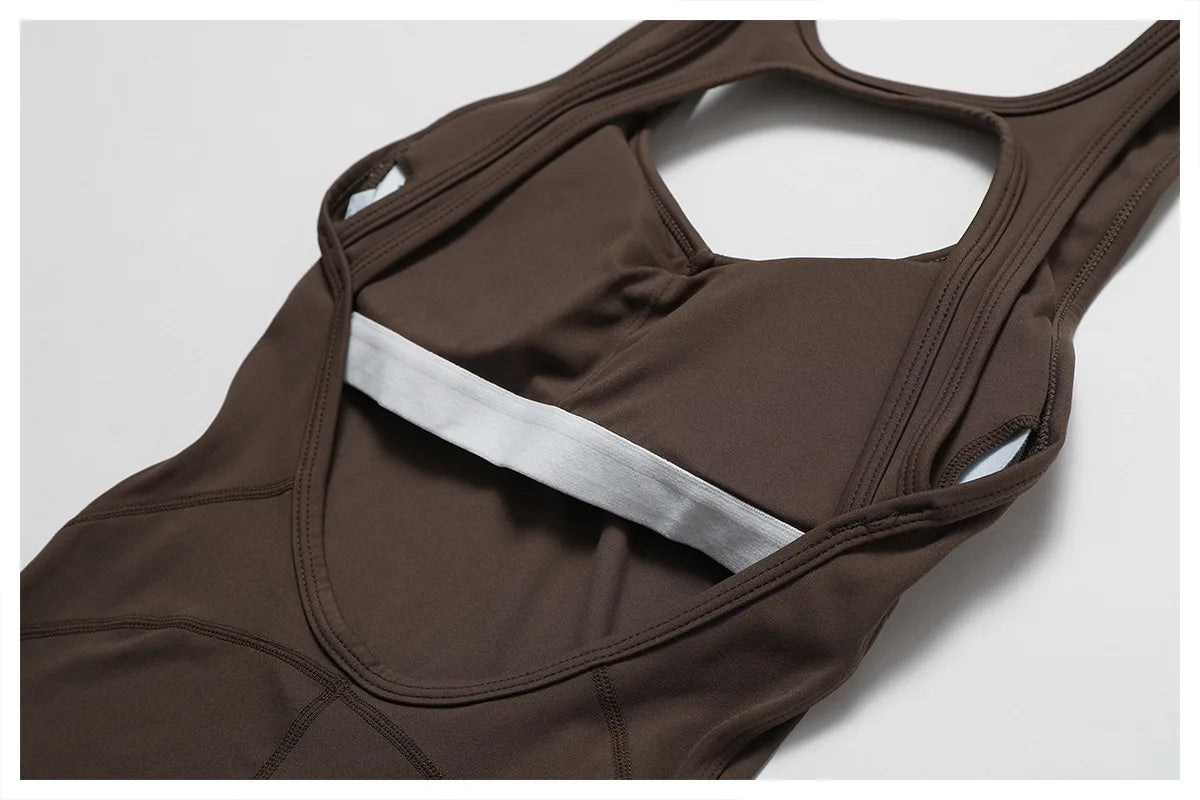 Women's open back V jumpsuit gym set by The Clothing Company Sydney, featuring a stretch fitness romper for yoga and workout training.