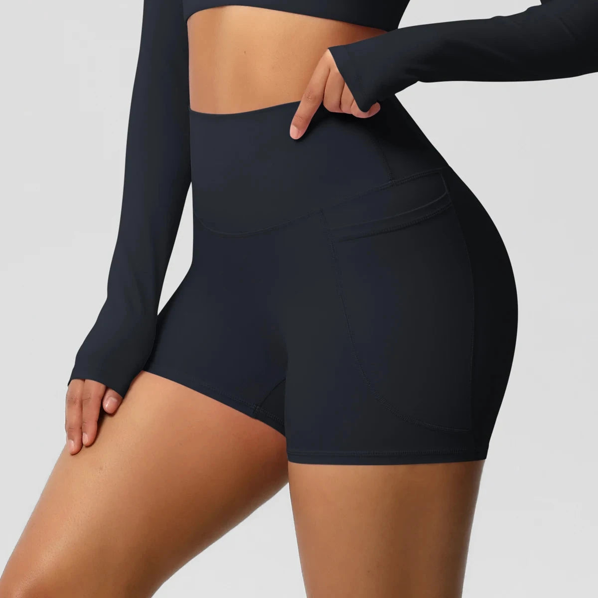 High-waisted bicycle yoga pants with pockets, quick-drying, breathable fabric, gym push-up style, by The Clothing Company Sydney.