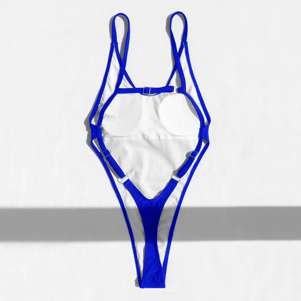 Backless micro thong one-piece swimsuit for women by The Clothing Company Sydney, showing sleek design and minimal coverage.