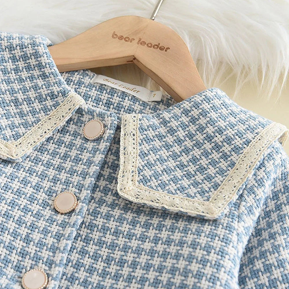 Three-piece girls' spring autumn plaid vest dress and coat set by The Clothing Company Sydney, showing stylish retro kids' outfits.