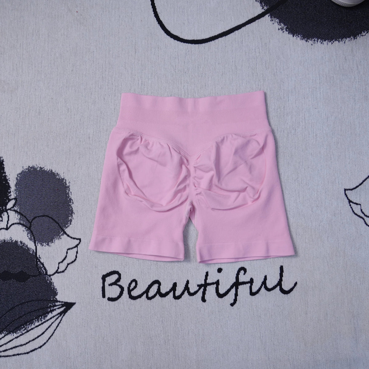 Women's high-waisted seamless yoga shorts by The Clothing Company Sydney, breathable, butt-lifting, ideal for gym and running workouts.