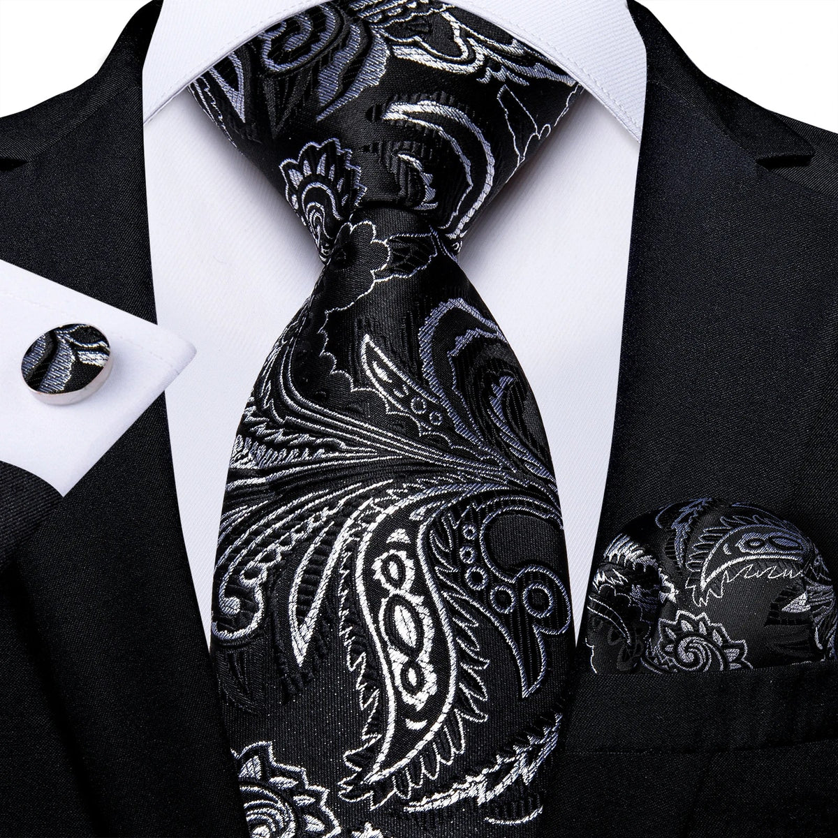 Men's gray paisley silk tie set with wedding tie, pocket square, and cufflinks, featuring elegant patterns and luxurious fabric.