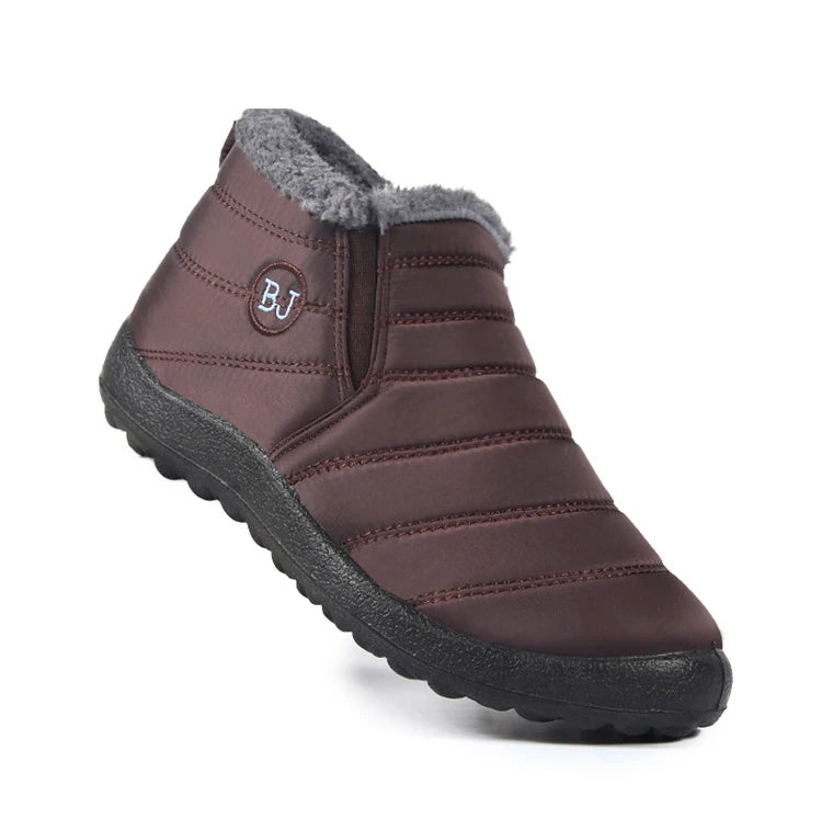 Women’s waterproof fur snow boots by The Clothing Company Sydney, slip-on ankle footwear with cozy lining and rugged soles for winter.