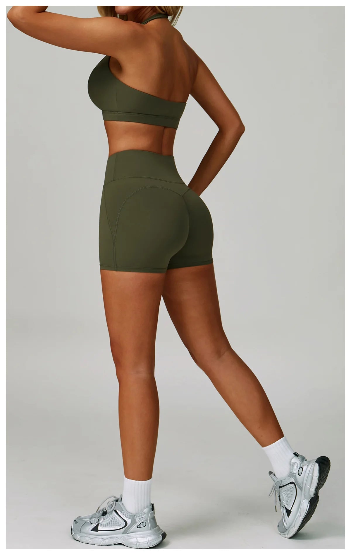 Women's fitness tracksuit set with high-waist leggings and sports bra from The Clothing Company Sydney, ideal for yoga and gym workouts.