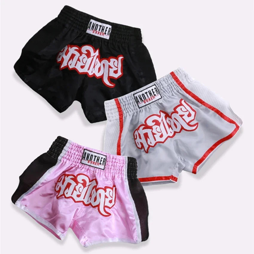 Embroidered Muay Thai boxing shorts with intricate design from The Clothing Company Sydney, featuring vibrant colors and lightweight fabric.