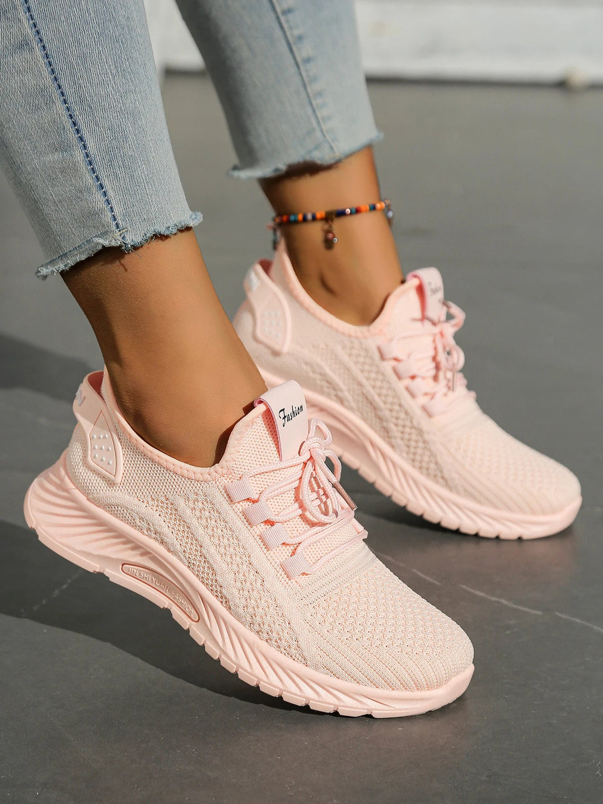Women's Fall casual sneakers by The Clothing Company Sydney featuring fly weave design and lace-up closure.