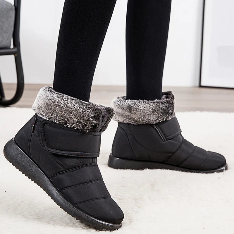 Women's fur-lined waterproof ankle boots by The Clothing Company Sydney with plush insoles and rubber soles for winter warmth.