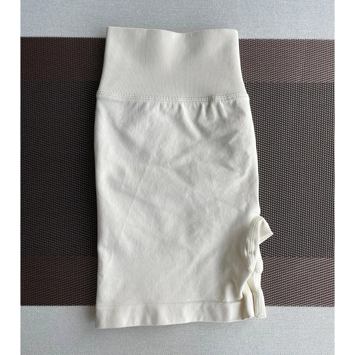 Solid seamless half pants for women, soft fitness shorts by The Clothing Company Sydney, ideal for yoga, gym, running, and cycling.