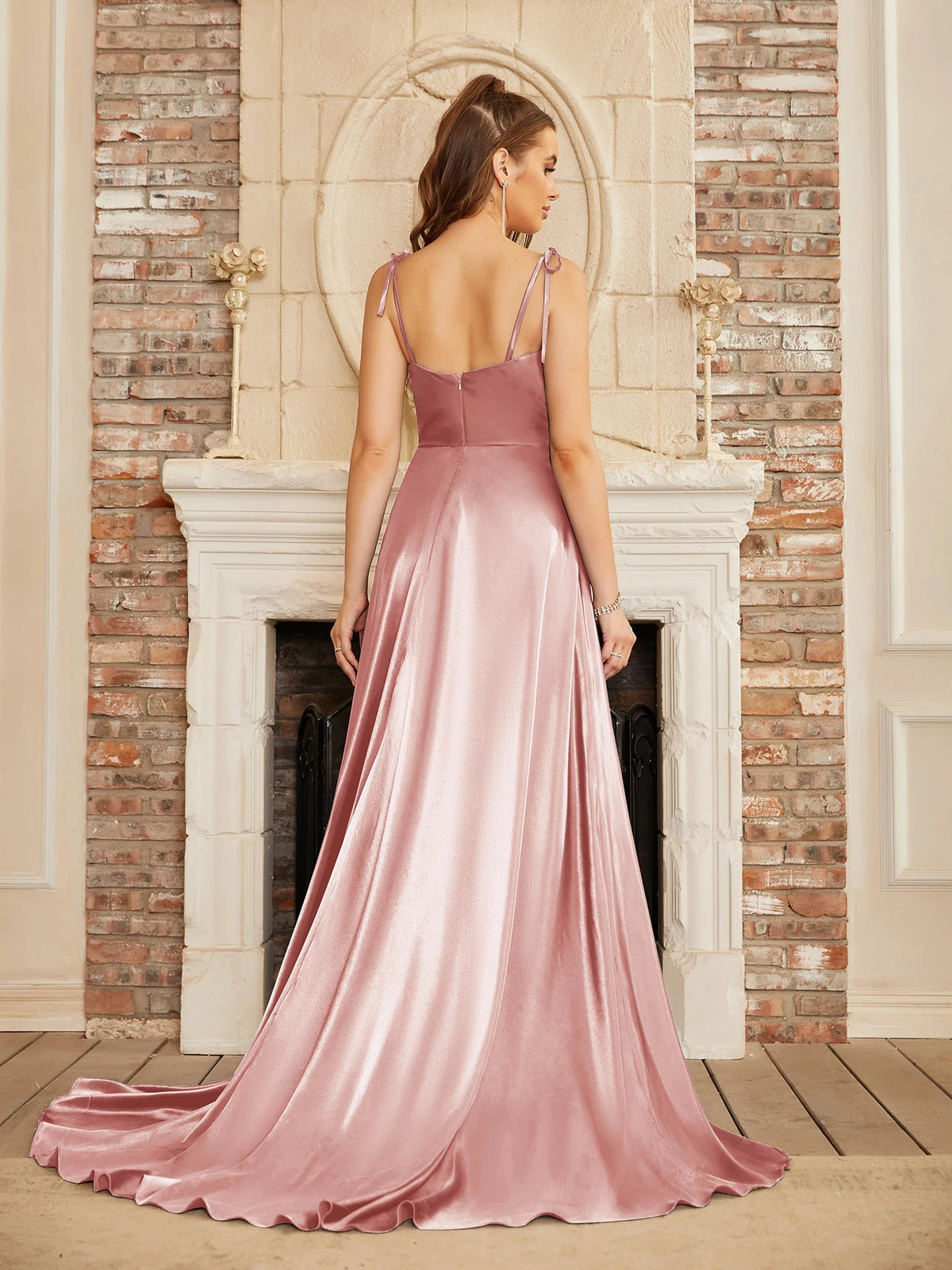 Mint green satin bridesmaid dress by The Clothing Company Sydney with side slit, backless design, spaghetti straps, perfect for summer evenings.