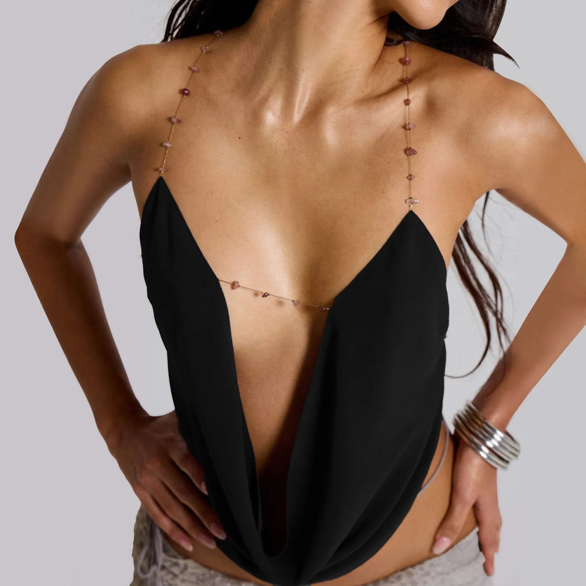 Women's Y2K style camisole top with deep V neck, spaghetti straps, crop top design, from The Clothing Company Sydney.