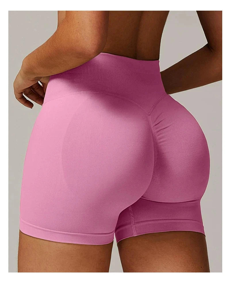 Solid seamless half pants for women, soft fitness shorts from The Clothing Company Sydney, ideal for yoga, gym, running, and cycling.