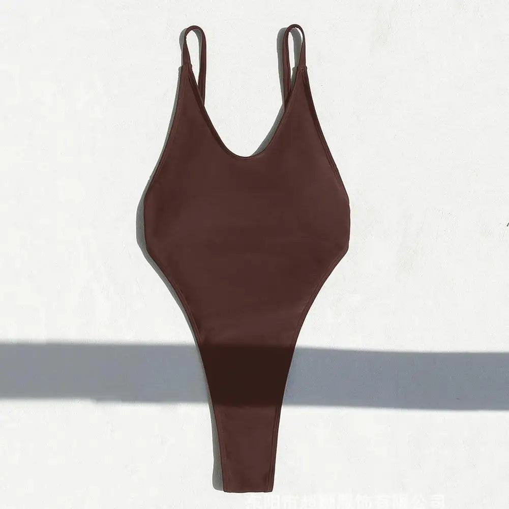 Backless micro thong one-piece swimsuit for women by The Clothing Company Sydney, featuring minimal coverage and sleek swimwear design.