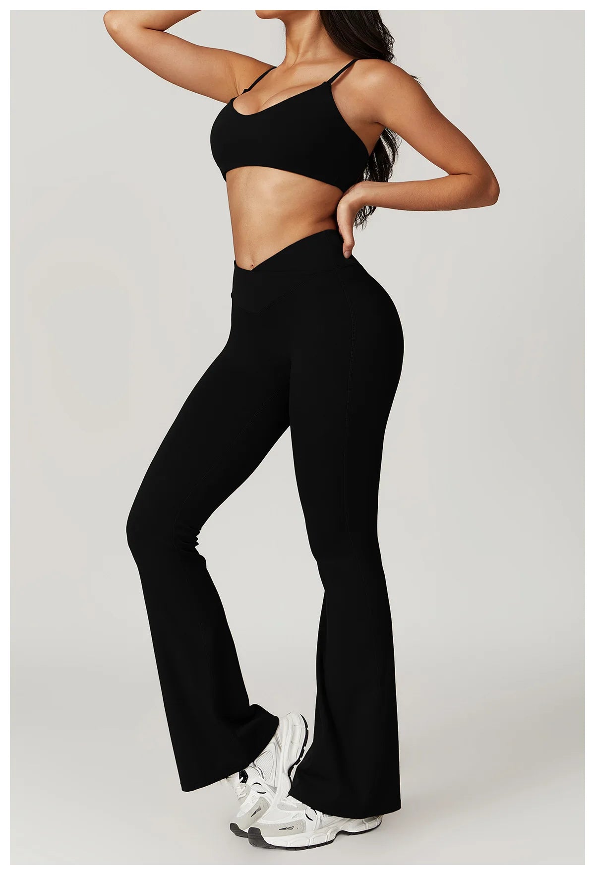 Two-piece women's fitness set including a crop top, sports bra, and leggings from The Clothing Company Sydney for yoga and gym workouts.