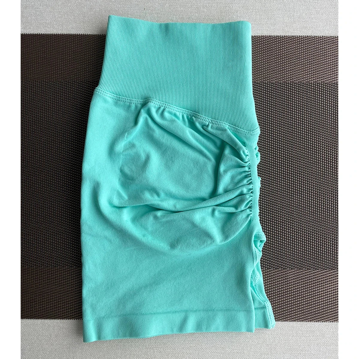 Solid seamless half pants for women, soft fitness gym and yoga shorts from The Clothing Company Sydney, suitable for running and cycling.