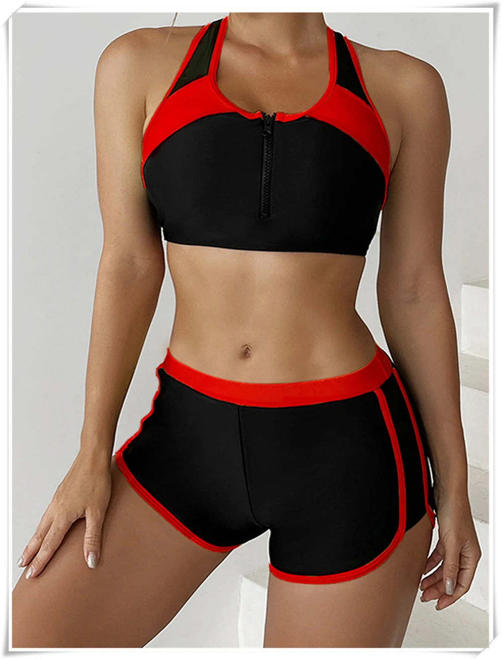 Two-piece swimsuit set with zipper tankini top and high-waist shorts, perfect for summer beachwear and swimming.