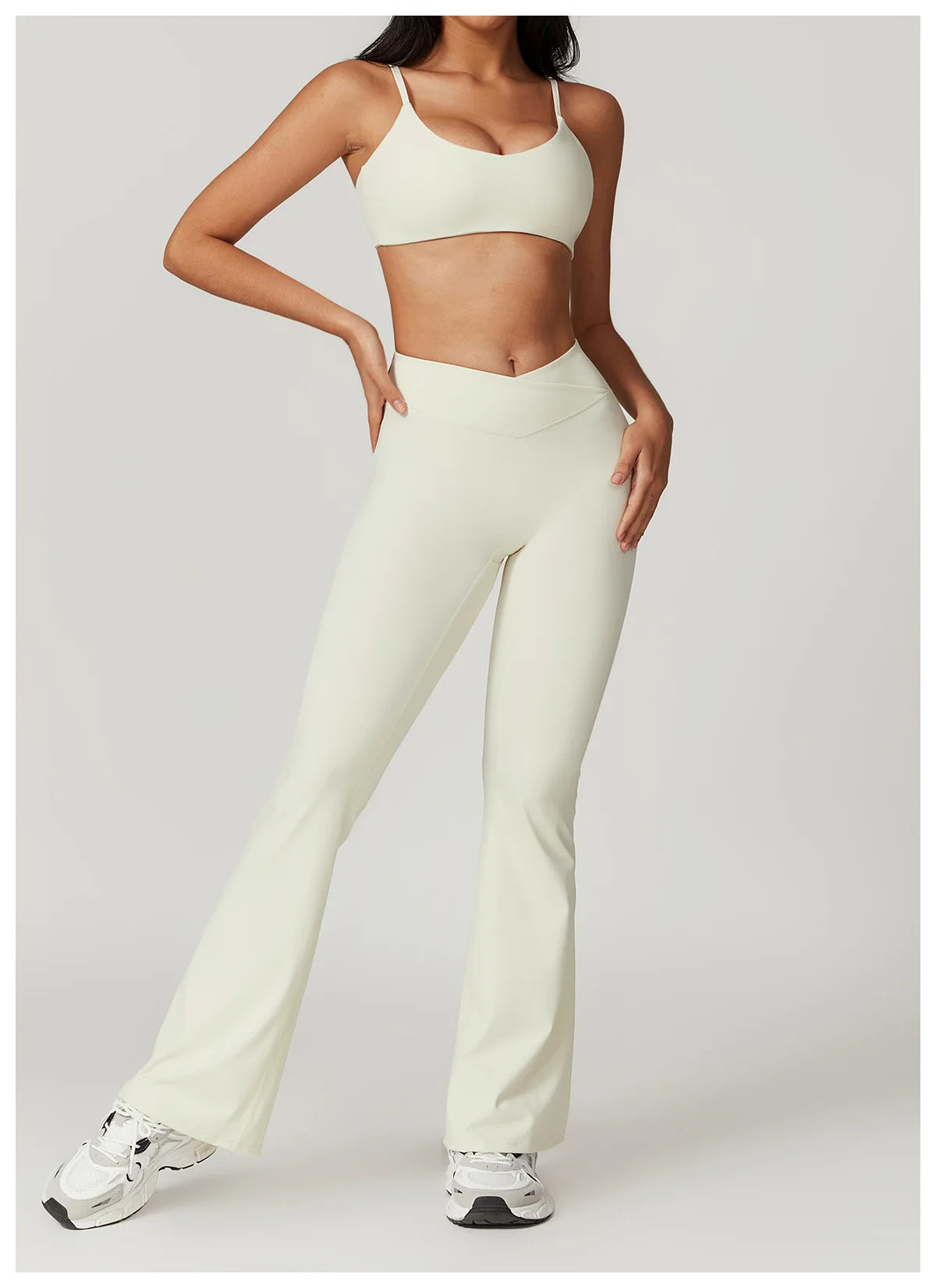 Two-piece women's fitness set including a crop top, sports bra, and leggings from The Clothing Company Sydney for yoga and gym workouts.