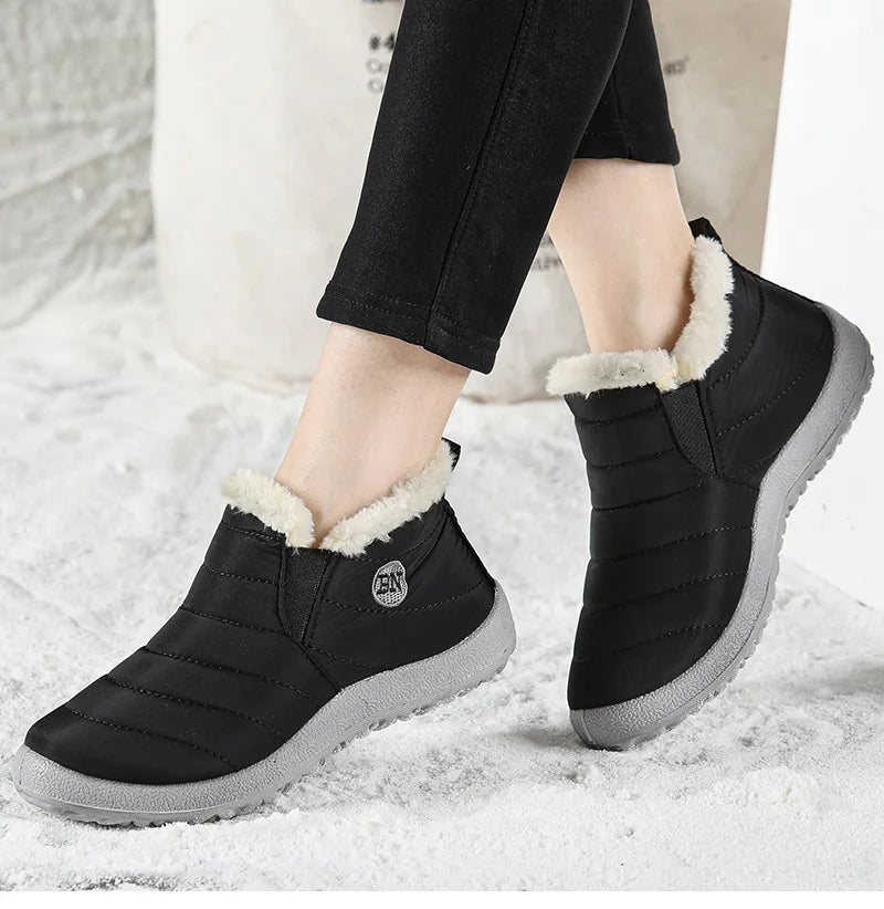 Men's slip-on winter ankle boots by The Clothing Company Sydney, waterproof snow shoes with fur lining and rugged soles.