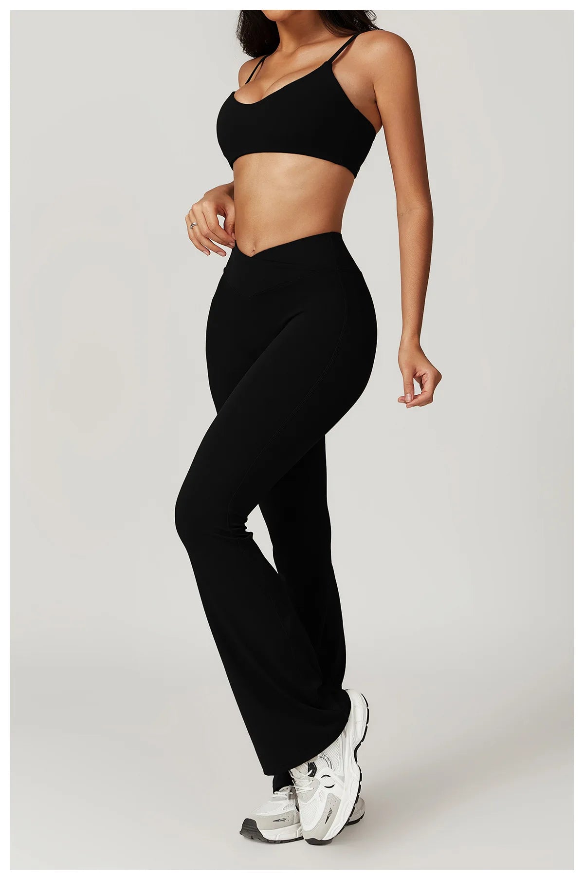 Two-piece women's fitness set featuring a short sleeve crop top and gym leggings from The Clothing Company Sydney, ideal for yoga and workouts.