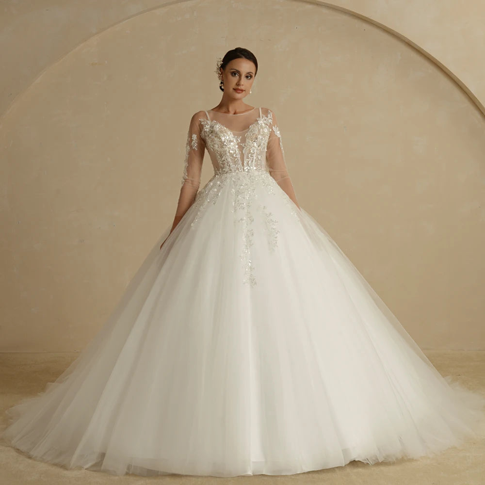 Elegant ivory strapless A-line glitter wedding dress with off-the-shoulder design and bling accents, by The Clothing Company Sydney.
