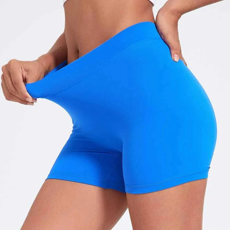 High-waisted V-back yoga shorts by The Clothing Company Sydney, made of nylon, designed for fitness, training, and hip-lifting workouts.