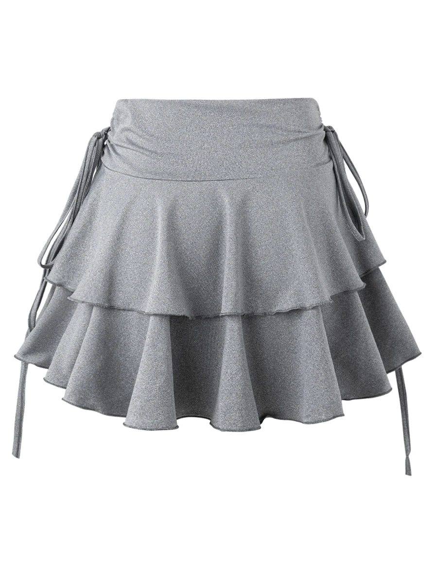 Women's summer high waist slim fit elastic waist skirt by The Clothing Company Sydney, shown in a stylish outdoor setting.