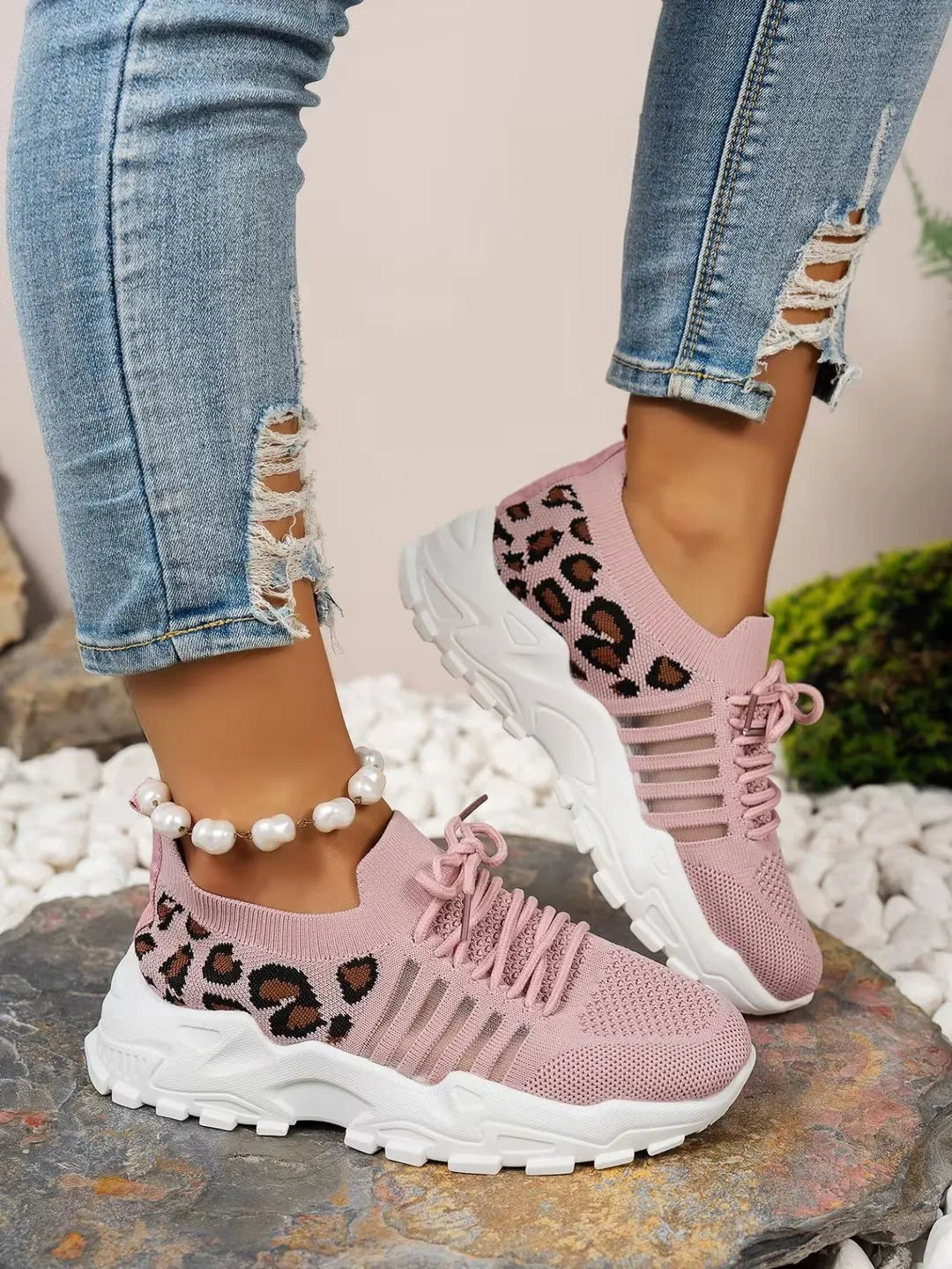Leopard print women's waterproof sneakers from The Clothing Company Sydney, stylish footwear with a bold animal pattern.