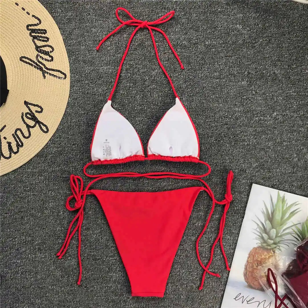 Neon pink Brazilian bikini set for women, halter swimwear by The Clothing Company Sydney, showing the two-piece bathing suit.