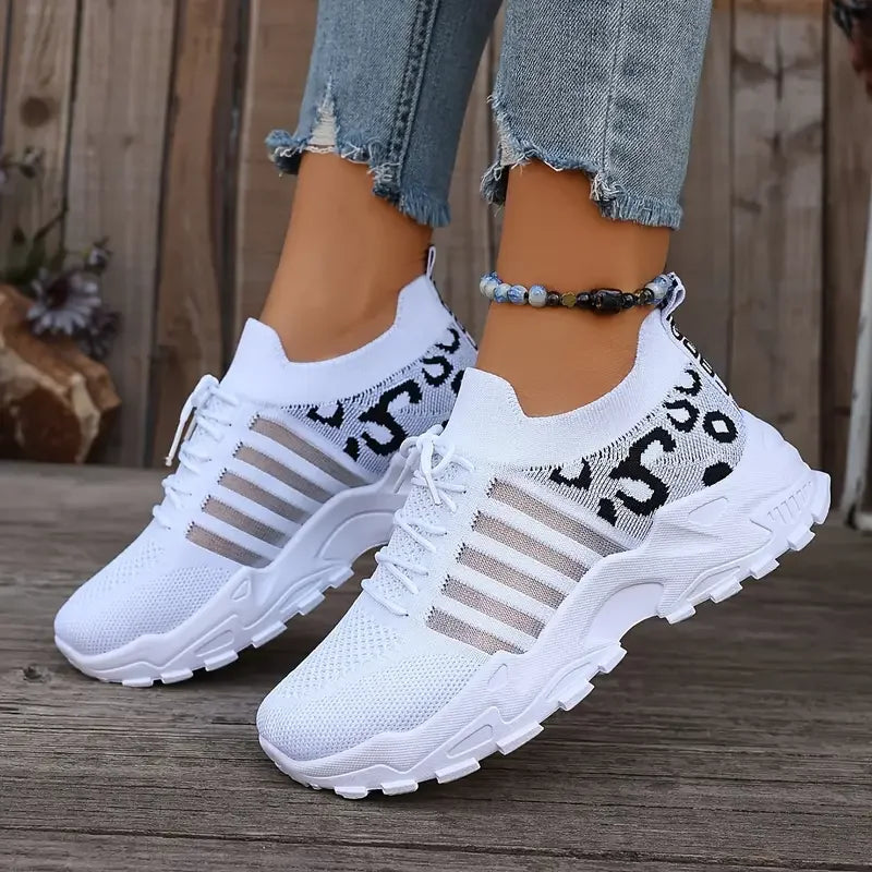 Leopard print women's waterproof sneakers from The Clothing Company Sydney, showcasing stylish footwear with bold animal pattern.