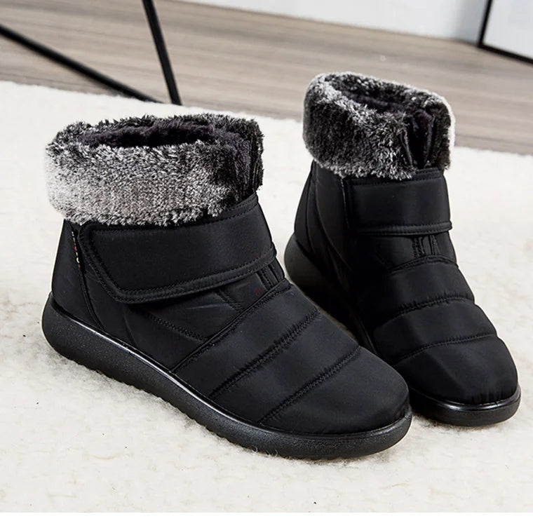 Women's fur-lined waterproof ankle boots by The Clothing Company Sydney with plush insoles and rubber soles for winter warmth.