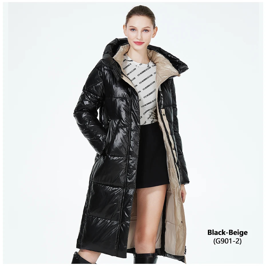 Women’s long hooded winter parka by The Clothing Company Sydney, thick quilted puffer jacket with pockets, suitable for cold weather.