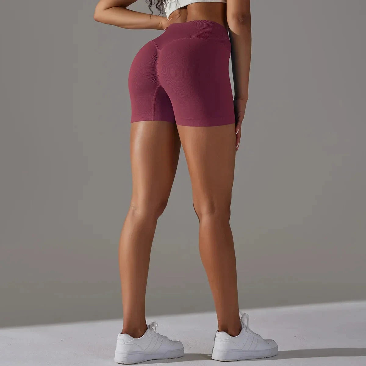 Women’s high waist yoga leggings from The Clothing Company Sydney, seamless sports shorts with scrunch butt design, perfect for workout.