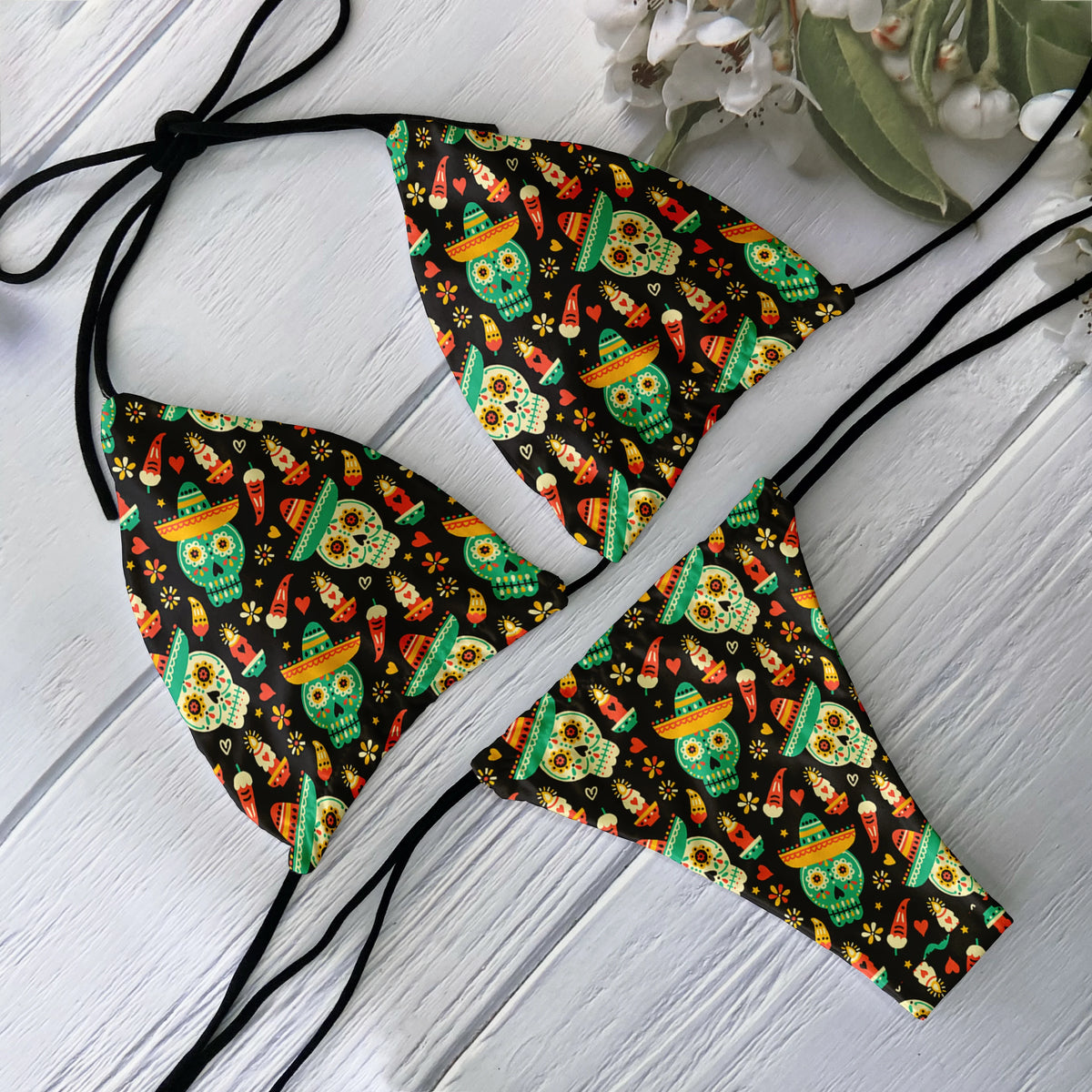 Backless skull pattern bikini set for women, low waist swimsuit by The Clothing Company Sydney, ideal for beach and surfing.