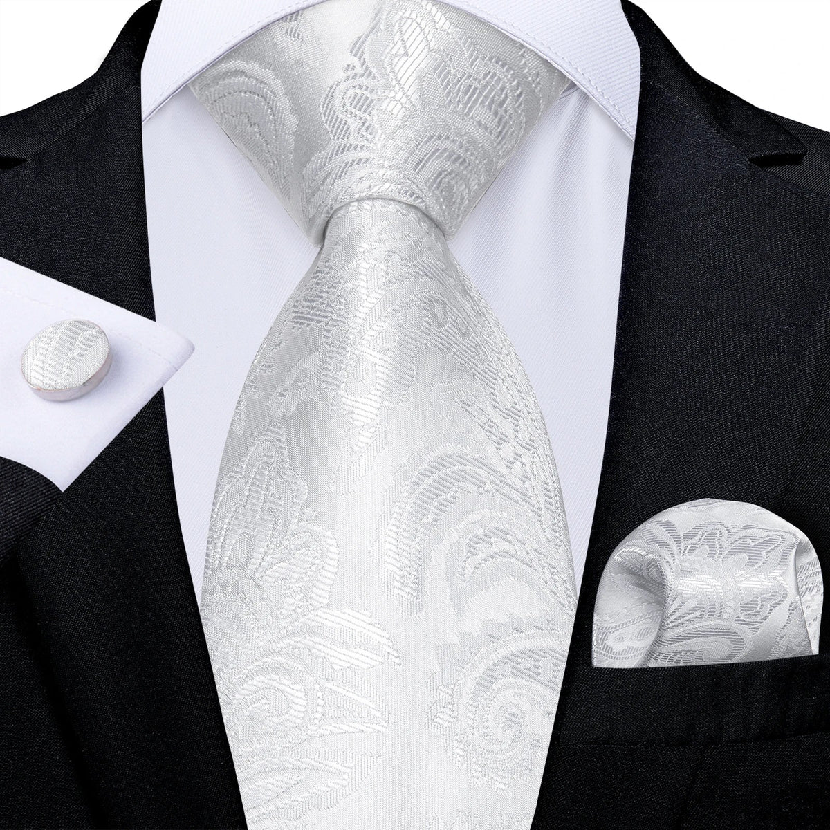 Men's gray paisley silk tie set with matching pocket square and cufflinks, ideal for weddings and formal occasions.