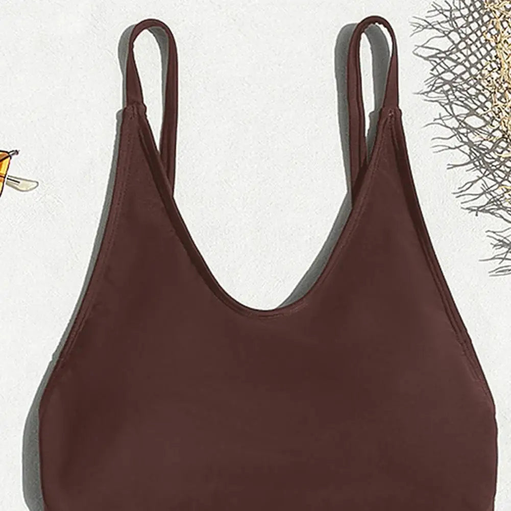 Backless micro thong one-piece swimsuit for women by The Clothing Company Sydney, featuring a sleek, minimal design and smooth fabric.