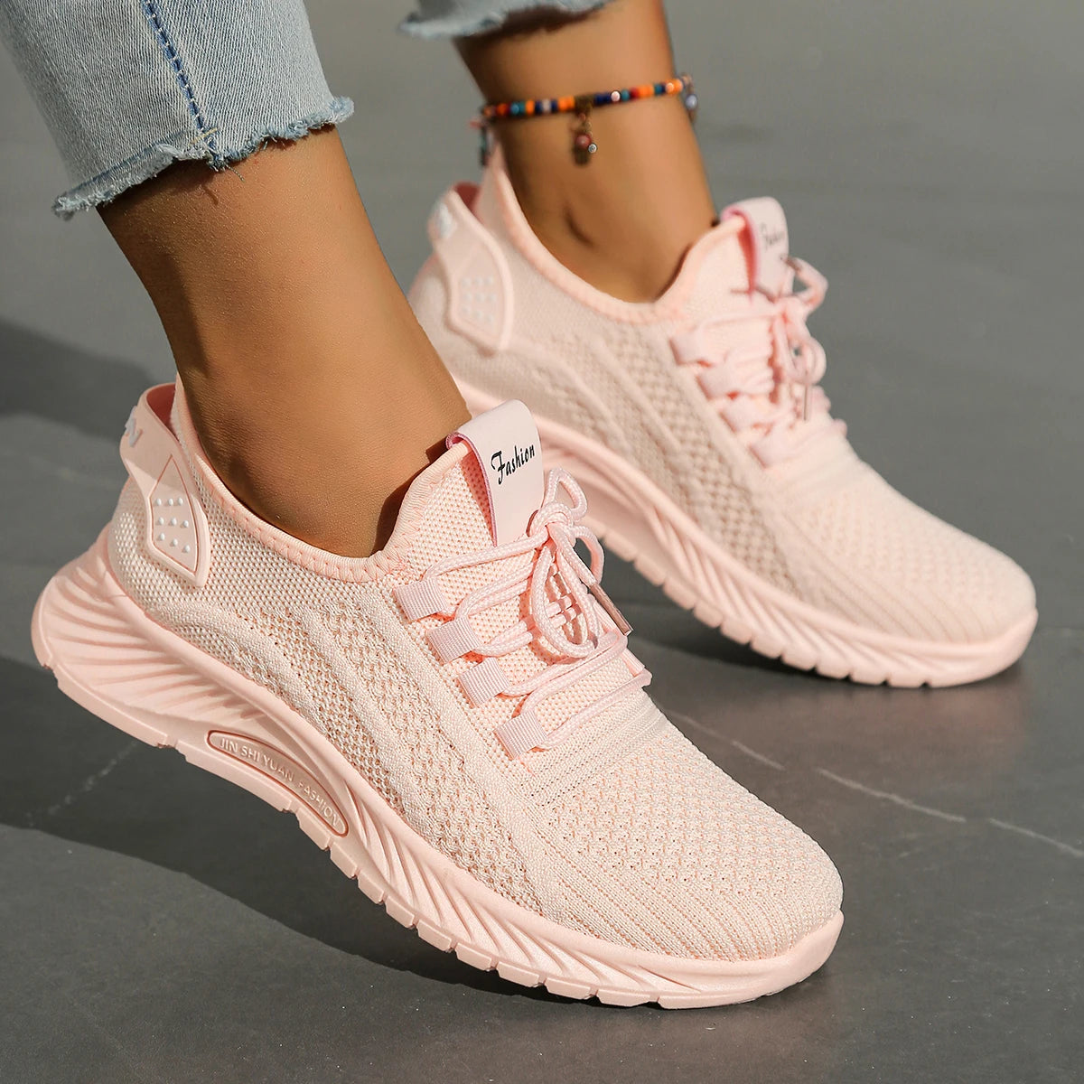 Women's casual fall sneakers by The Clothing Company Sydney featuring fly weave design and lace-up closure.