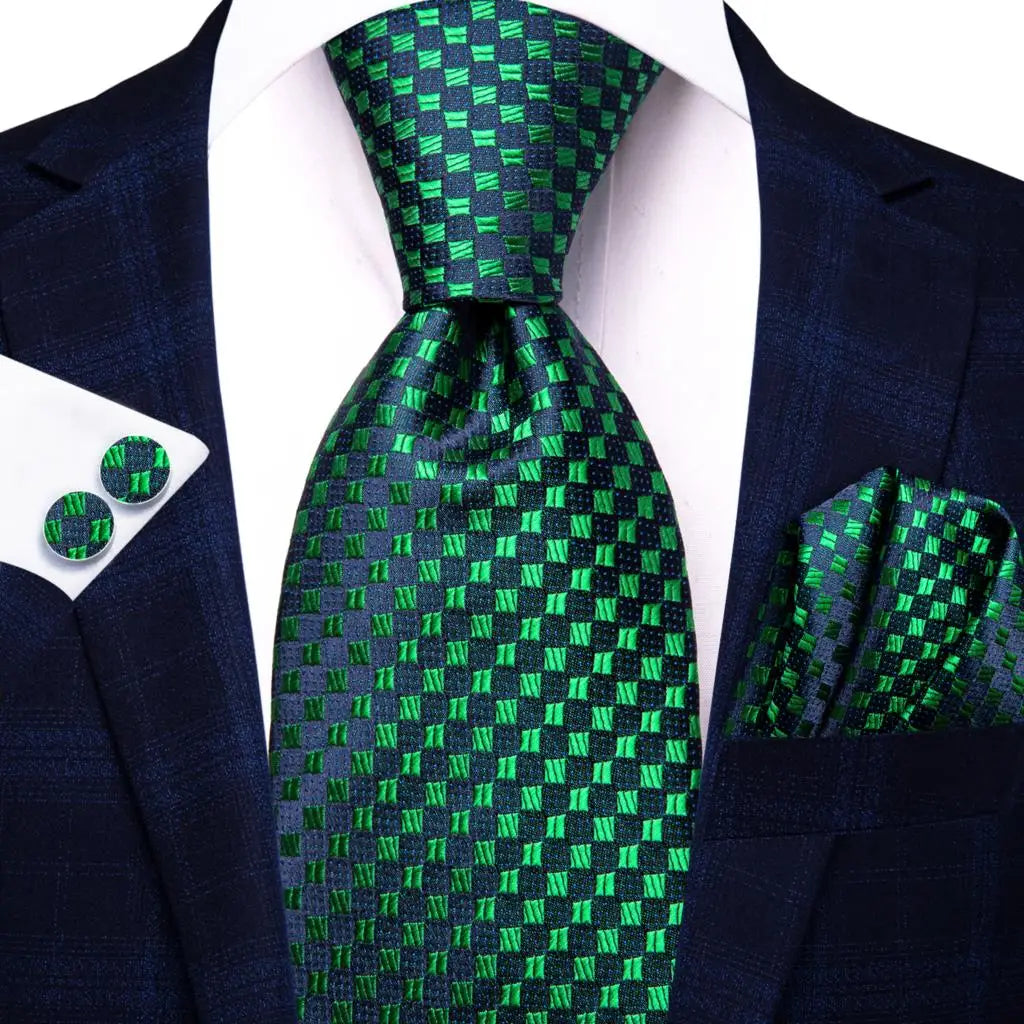 Green paisley silk tie set for men including necktie, pocket square, and cufflinks, with accessories from The Clothing Company Sydney.