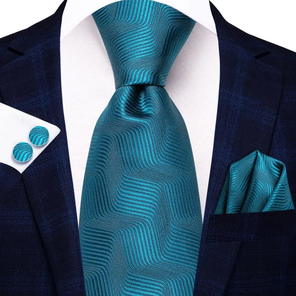 Green paisley silk tie set for men including necktie, pocket square, and cufflinks from The Clothing Company Sydney.