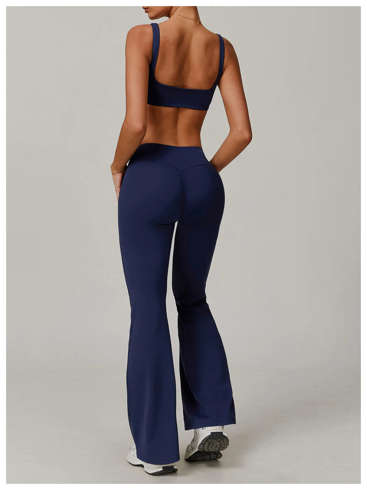 Two-piece women's yoga and workout set by The Clothing Company Sydney featuring sports bra and leggings for fitness and activewear.