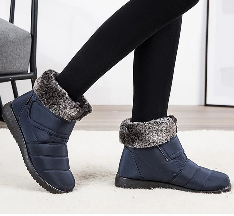 Women's fur-lined waterproof ankle boots by The Clothing Company Sydney with plush insoles and rubber soles for winter warmth.