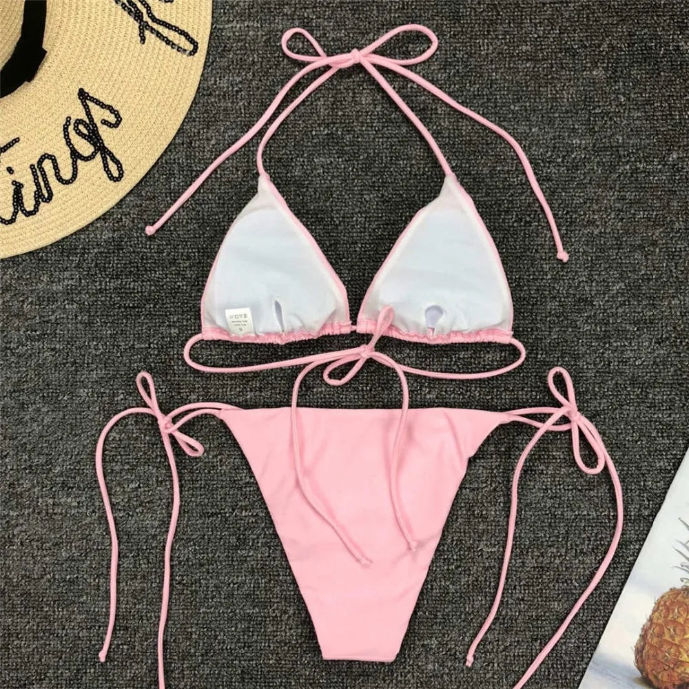 Neon pink Brazilian bikini set for women featuring halter top and matching bikini bottoms, stylish swimwear by The Clothing Company Sydney.