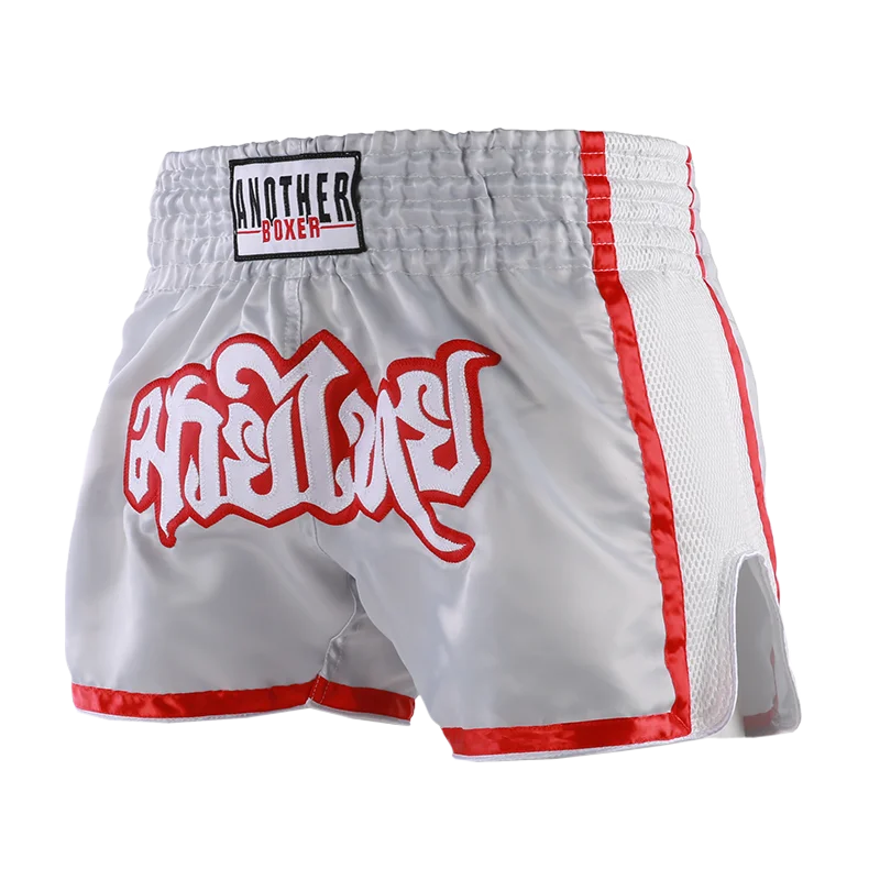 Embroidered Muay Thai boxing shorts by The Clothing Company Sydney with intricate stitching and vibrant design details.
