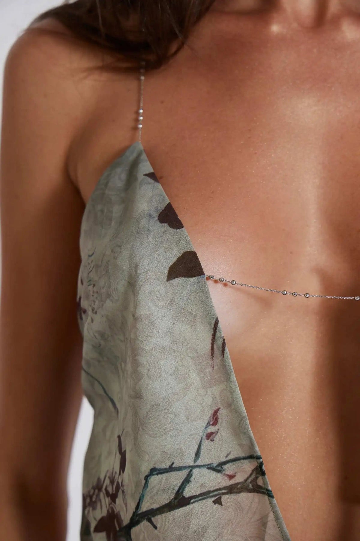 Women's Y2K style camisole top by The Clothing Company Sydney featuring deep V-neck, spaghetti straps, crop design, perfect for summer outfits.