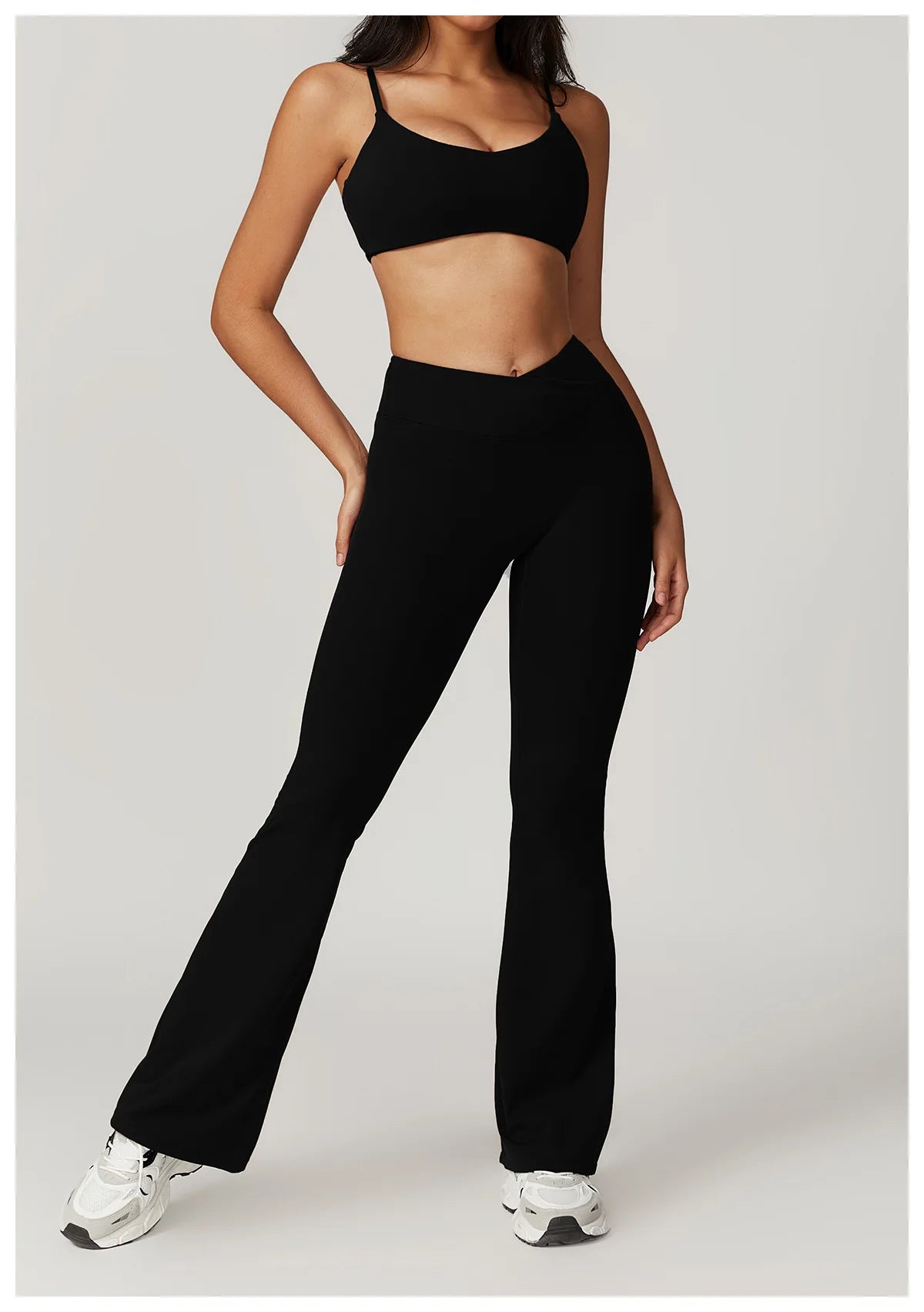 Two-piece women's fitness set by The Clothing Company Sydney with short sleeve crop top, sports bra, and gym leggings for active wear.