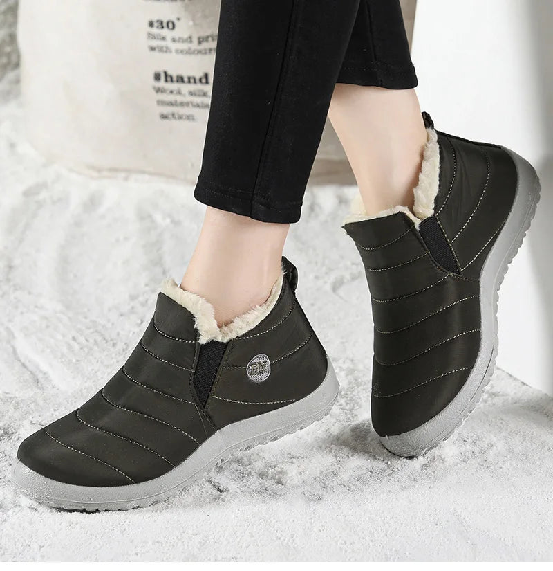 Men's slip-on winter ankle boots from The Clothing Company Sydney with fur lining and waterproof snow shoe design.