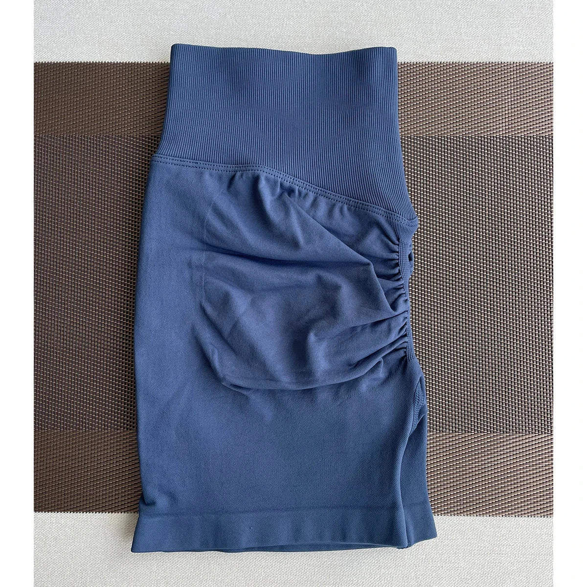 Solid seamless women's half pants by The Clothing Company Sydney, soft fitness shorts ideal for yoga, gym, running, and cycling.