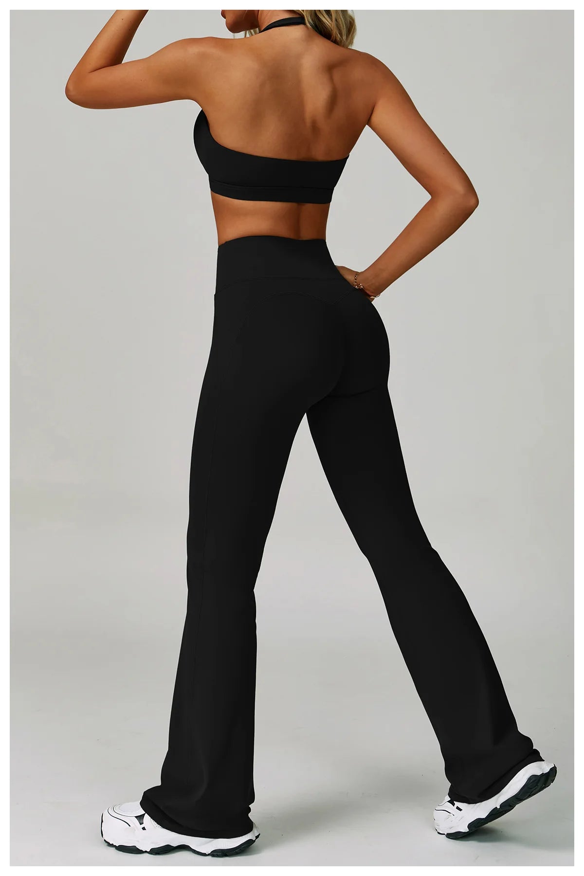 The Clothing Company Sydney women's fitness tracksuit with high waist leggings and sports bra, ideal for yoga and workout sessions.