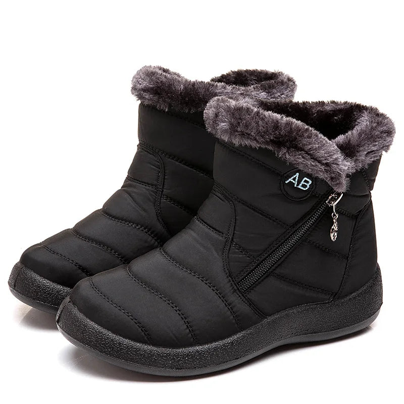 Women’s winter snow boots with warm fur lining, ankle footwear by The Clothing Company Sydney, suitable for cold weather.