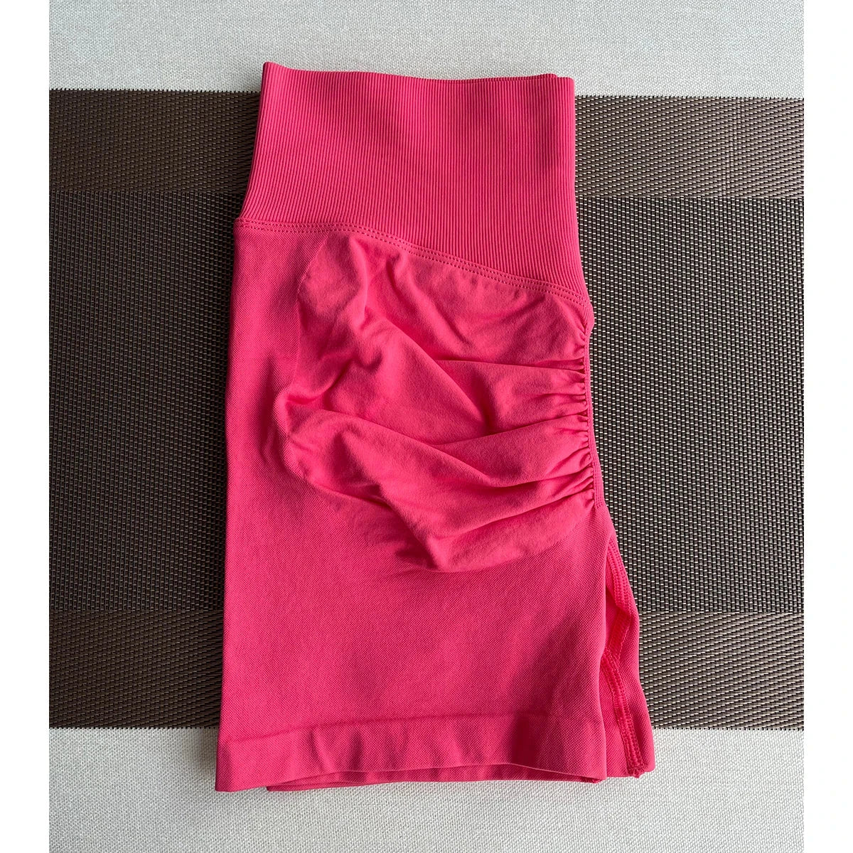 Solid seamless half pants for women, soft fitness workout shorts from The Clothing Company Sydney, ideal for yoga, gym, running, biking.